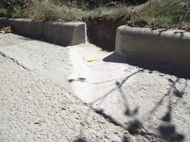 Finished water harvesting curb cut