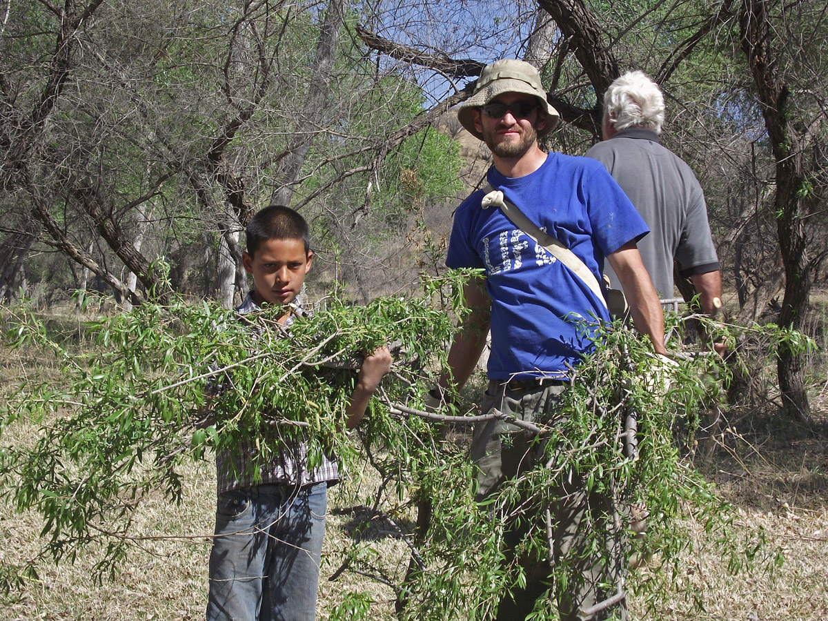 Volunteers working at riparian habitat restoration in Sonora, Mexico